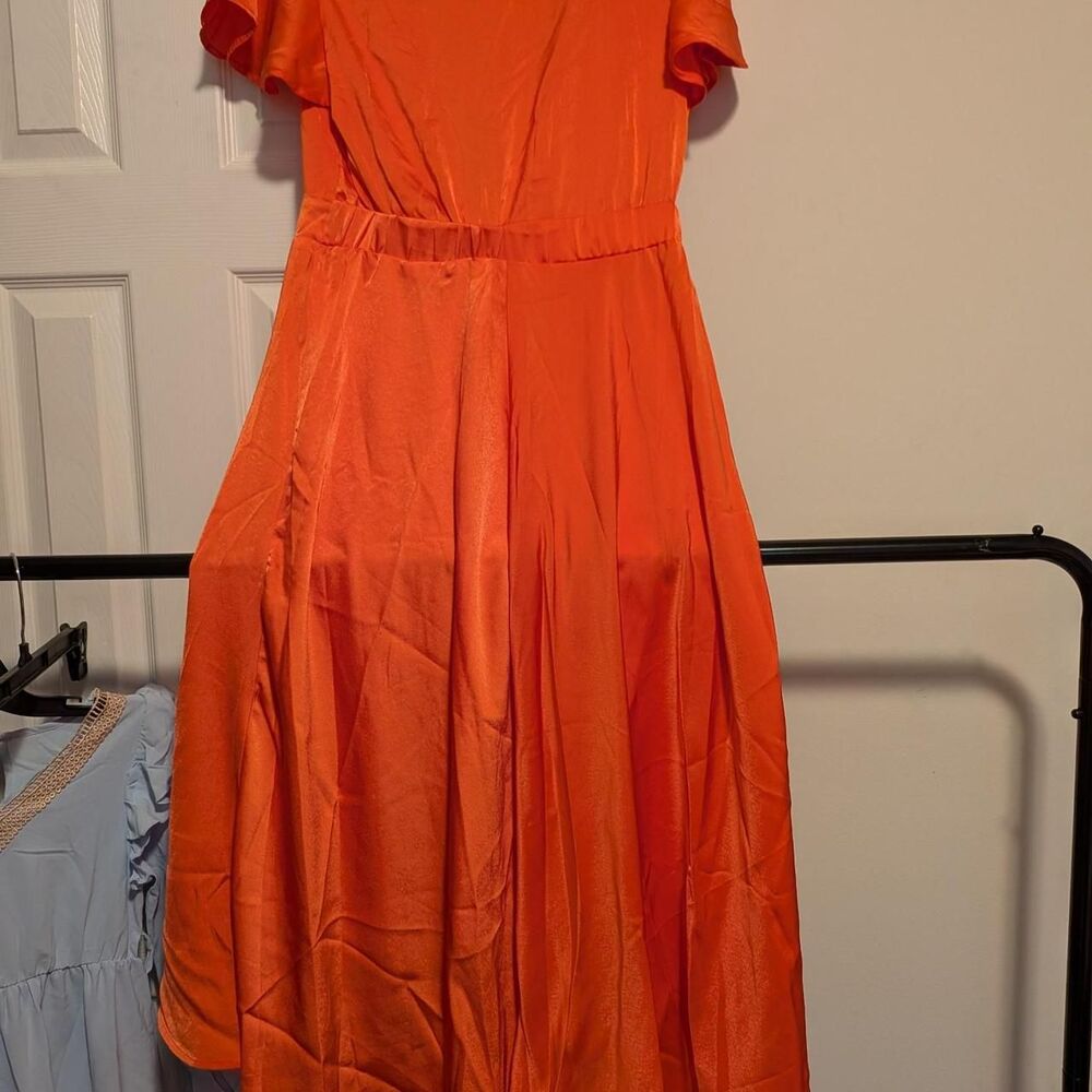Orange polyester & spandex midi dress with ruffle sleeves and tie waist